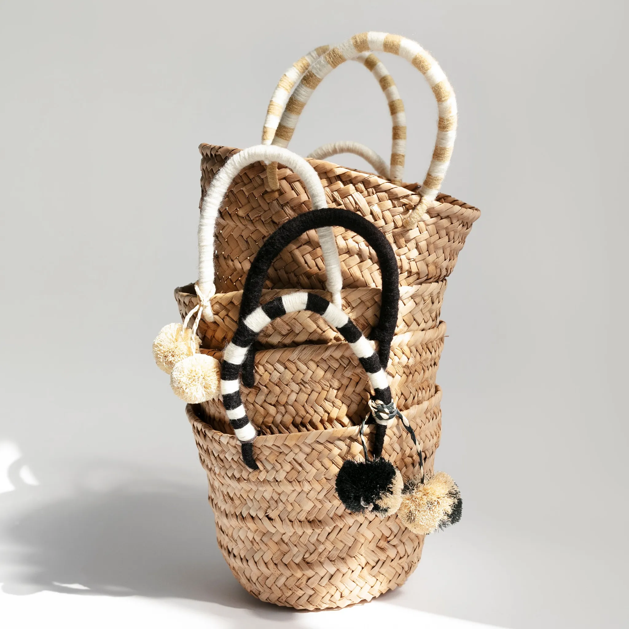 Mini St Tropez Pom Pom Straw Tote in Black and White